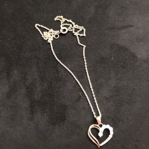 Silver heart shaped necklace